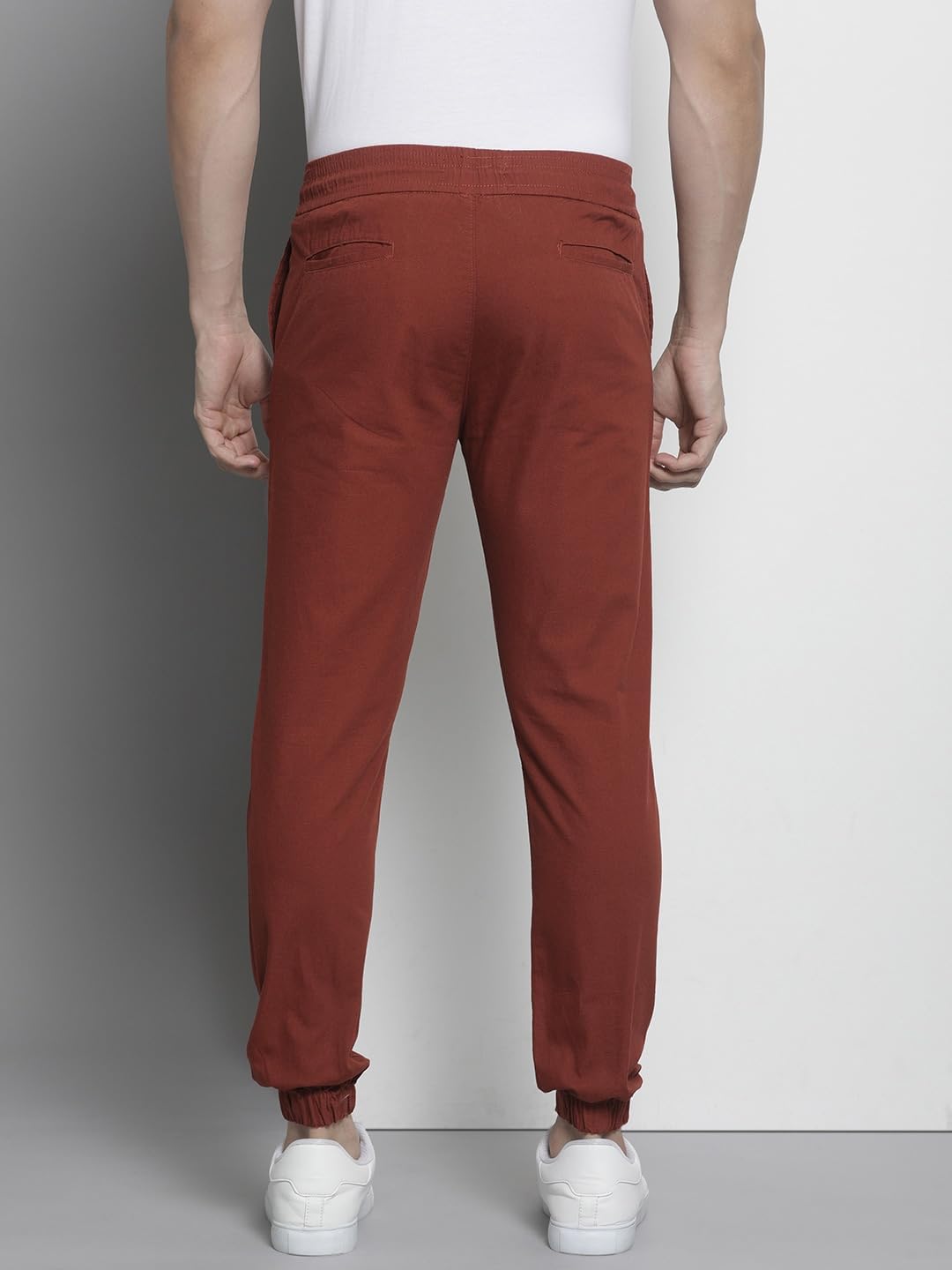 The Indian Garage Co Men Slim Fit Solid Mid-Rise Woven Joggers Orange