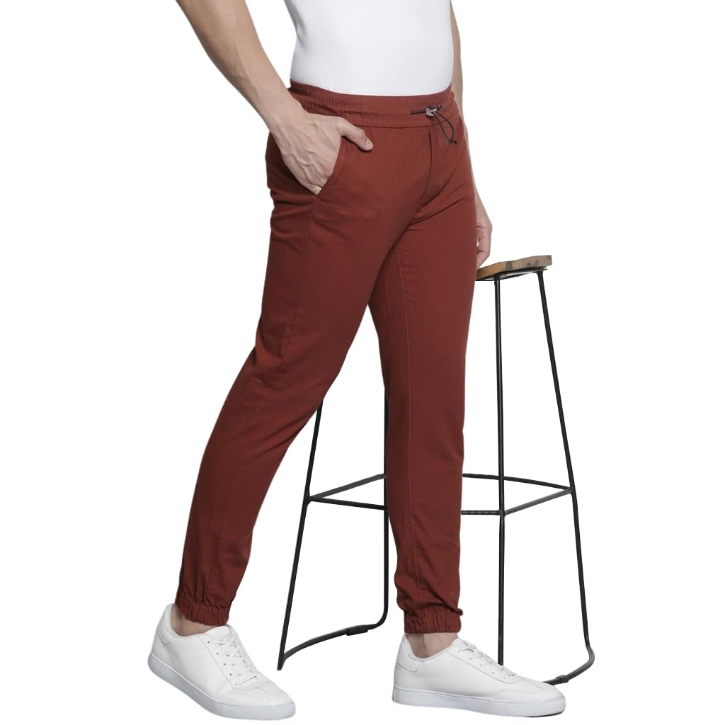 The Indian Garage Co Men Slim Fit Solid Mid-Rise Woven Joggers Orange