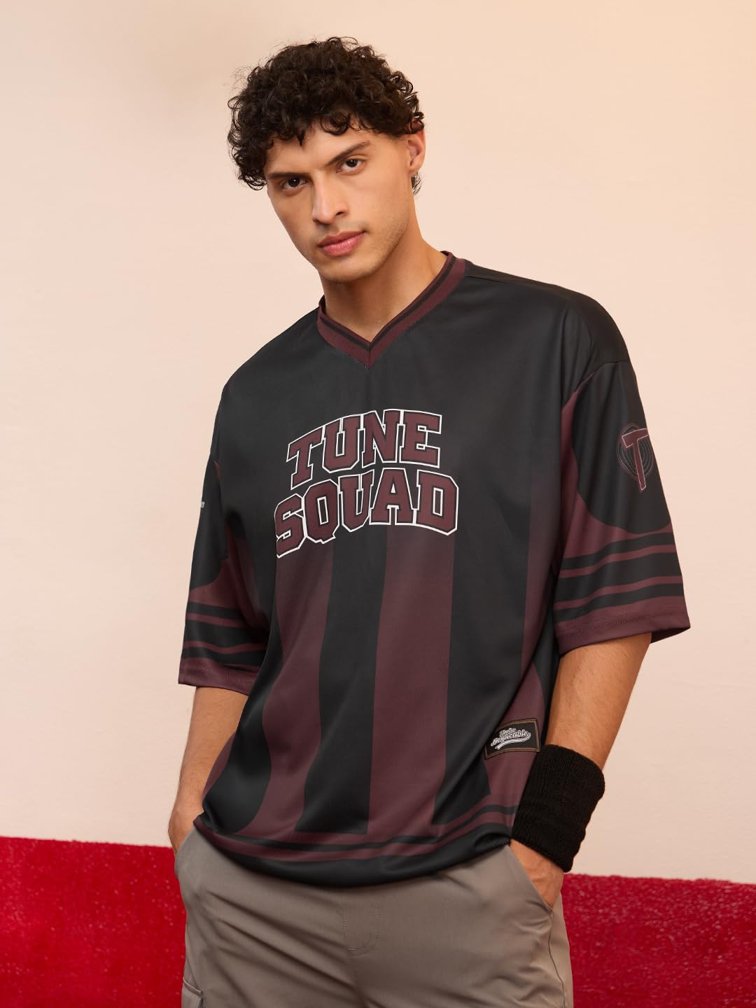 The Souled Store Looney Tunes: Daffy Men and Boys Short Sleeves V Neck Black and Brown Graphic Printed Polyester Oversized Jerse