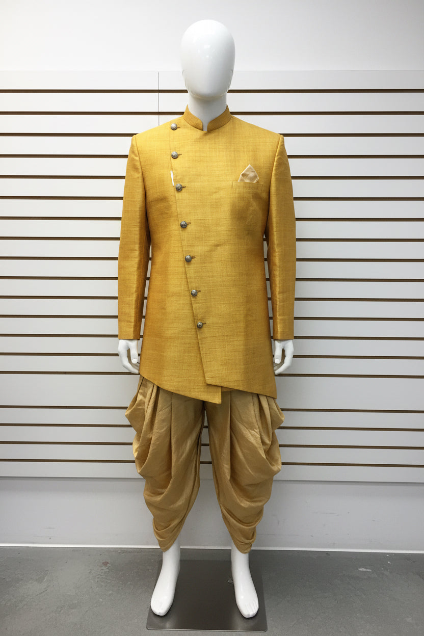 Yellow sherwani with gold dhoti pant