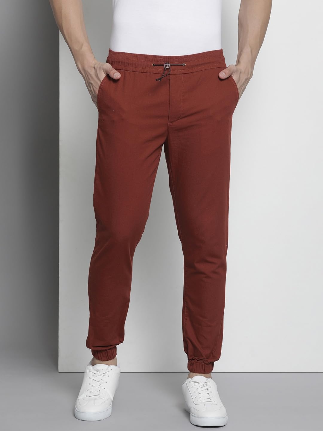 The Indian Garage Co Men Slim Fit Solid Mid-Rise Woven Joggers Orange