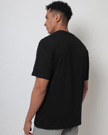 Bewakoof Mens Hangin Astronaut Graphic Printed 100% Cotton T-Shirt - Oversized Fit, Round Neck, Half Sleeves Black