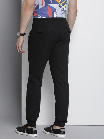 The Indian Garage Co Men Regular Fit Solid Mid-Rise Woven Joggers Black