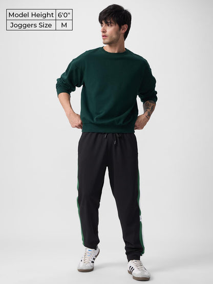 The Souled Store Velocity Men and Boys Drawstringed Black Solid Cotton Blend Oversized Joggers