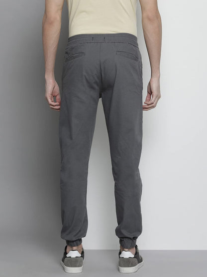 The Indian Garage Co Men Slim Fit Solid Mid-Rise Woven Joggers Grey