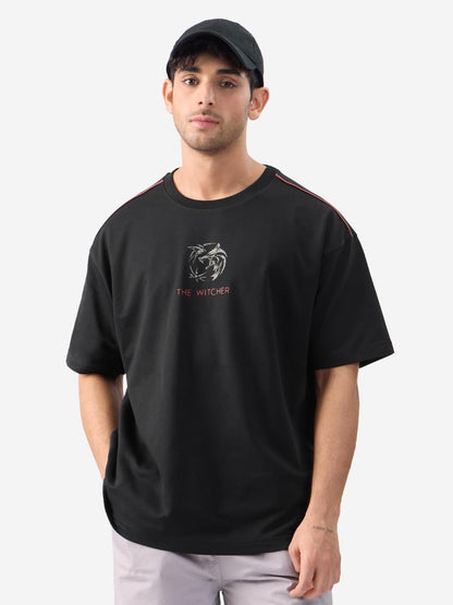 The Souled Store Official The Witcher: Basilisk Men and Boys Short Sleeves Round Neck Black Graphic Printed Cotton Oversized T-S