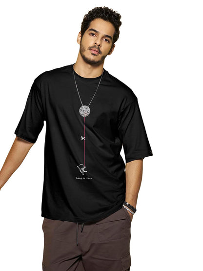 Bewakoof Mens Hangin Astronaut Graphic Printed 100% Cotton T-Shirt - Oversized Fit, Round Neck, Half Sleeves Black