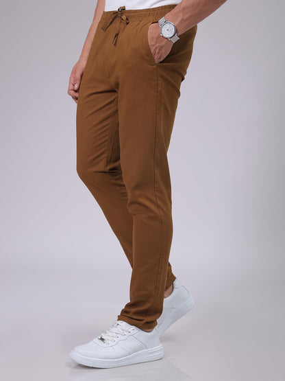 The Indian Garage Co Men Slim Fit Solid Mid-Rise Elasticated Linen Jogger Trouser Bronze Brown