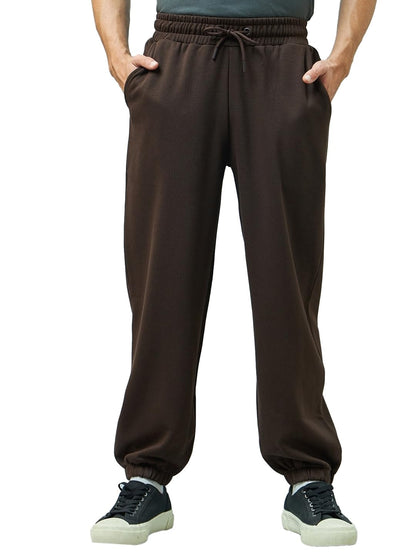 Bewakoof Mens Solid Super Loose Fit Cotton Blend Mid Rise Joggers_ 617457 Brown M