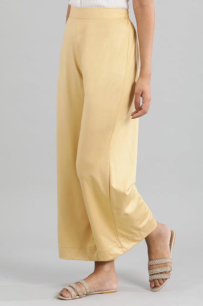 Aurelia Gold Solid Poly Blend Palazzo Ethnic Bottomwear