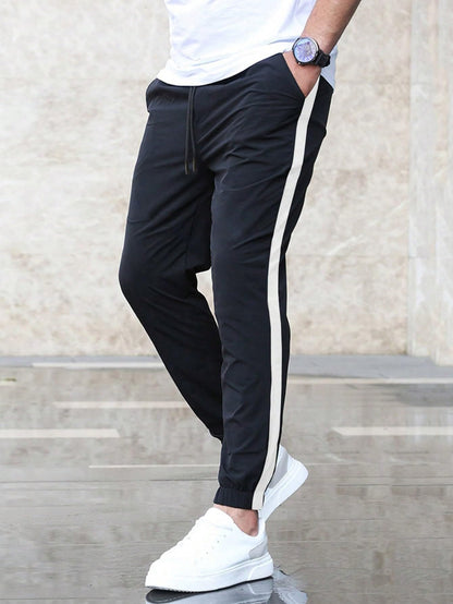 Shasmi Mens Athletic Jogger Black and White Contrast Side Color Block Patchwork Drawstring Waist Track Pant with Slit Pockets,