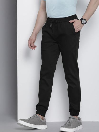 The Indian Garage Co Men Slim Fit Solid Mid-Rise Stretchable Chino Joggers Black