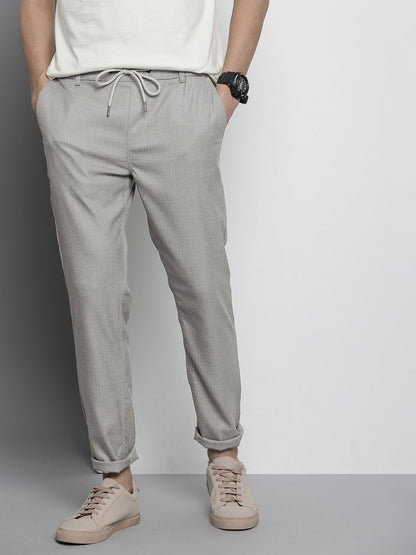 The Indian Garage Co Men Regular Fit Self Design Mid-Rise Stretchable Jogger Trousers Grey