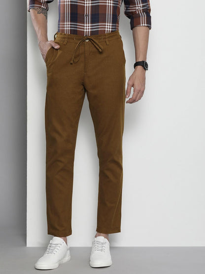 The Indian Garage Co Men Slim Fit Solid Mid-Rise Elasticated Linen Trousers Bronze Brown