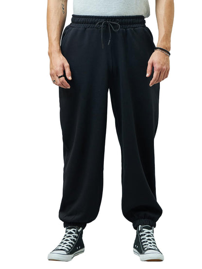 Bewakoof Mens Solid Super Loose Fit Cotton Blend Mid Rise Joggers_ 617465 Black S