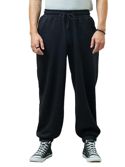 Bewakoof Mens Solid Super Loose Fit Mid Rise Cotton Blend Joggers_ 617465 Black Medium