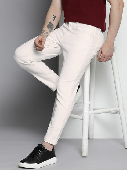 The Indian Garage Co Men Carrot Fit Solid Mid-Rise Stretchable Jeans White
