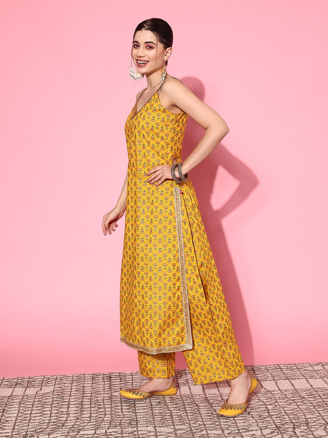 Varanga yellow floral printed spaghetti strap style straight kurta paire with bottom and contrast bottom