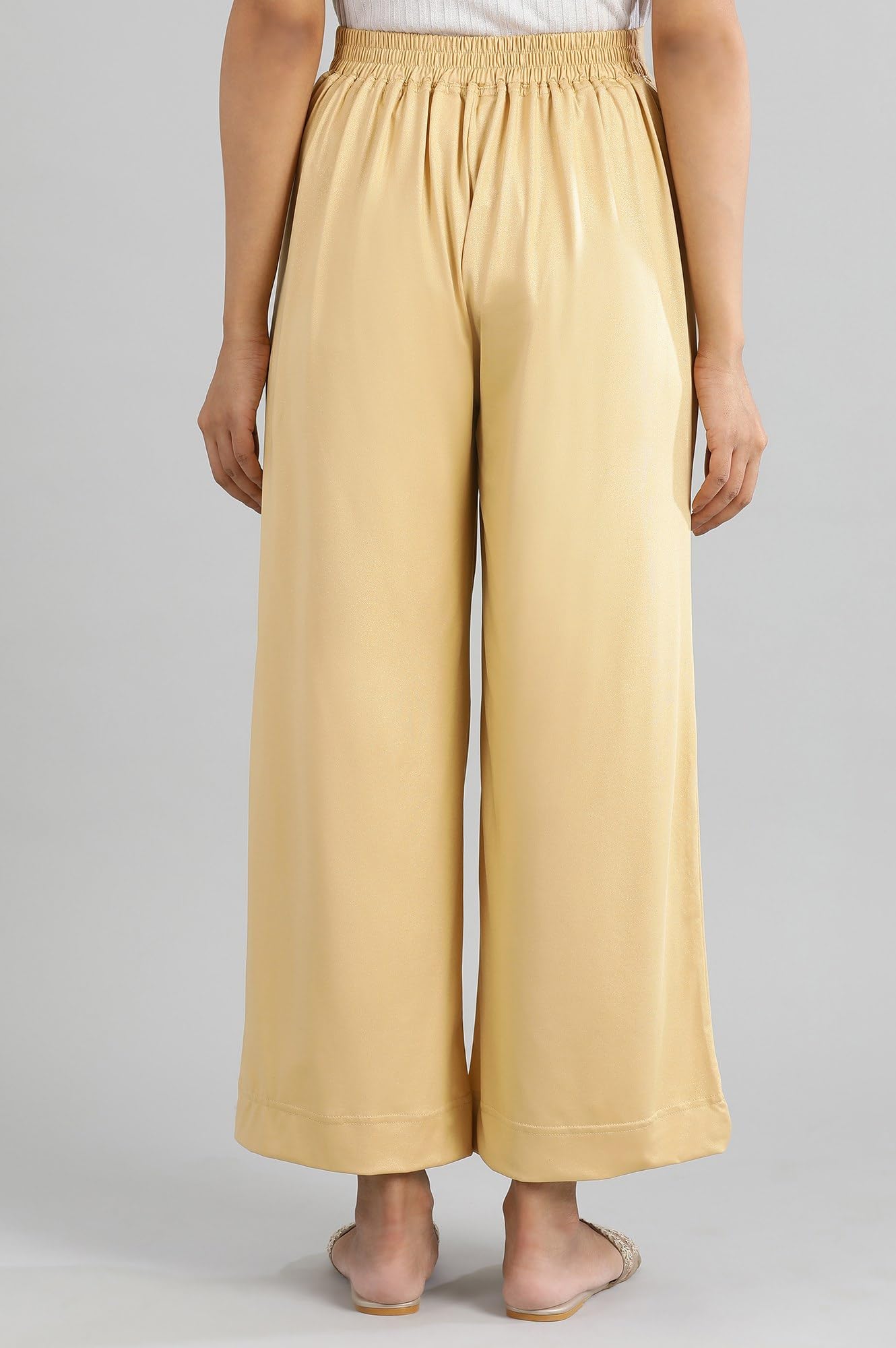 Aurelia Gold Solid Poly Blend Palazzo Ethnic Bottomwear