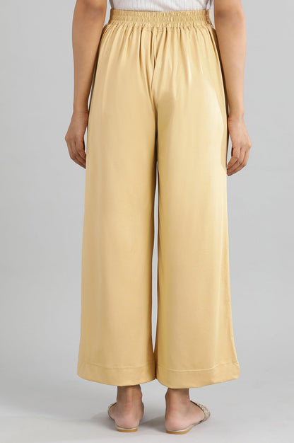 Aurelia Gold Solid Poly Blend Palazzo Ethnic Bottomwear
