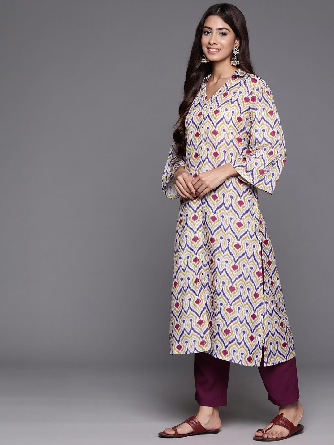 Varanga Women Off White Ikat Printed Shirt Collar Straight Kurta Paired with Violet Solid Bottom.