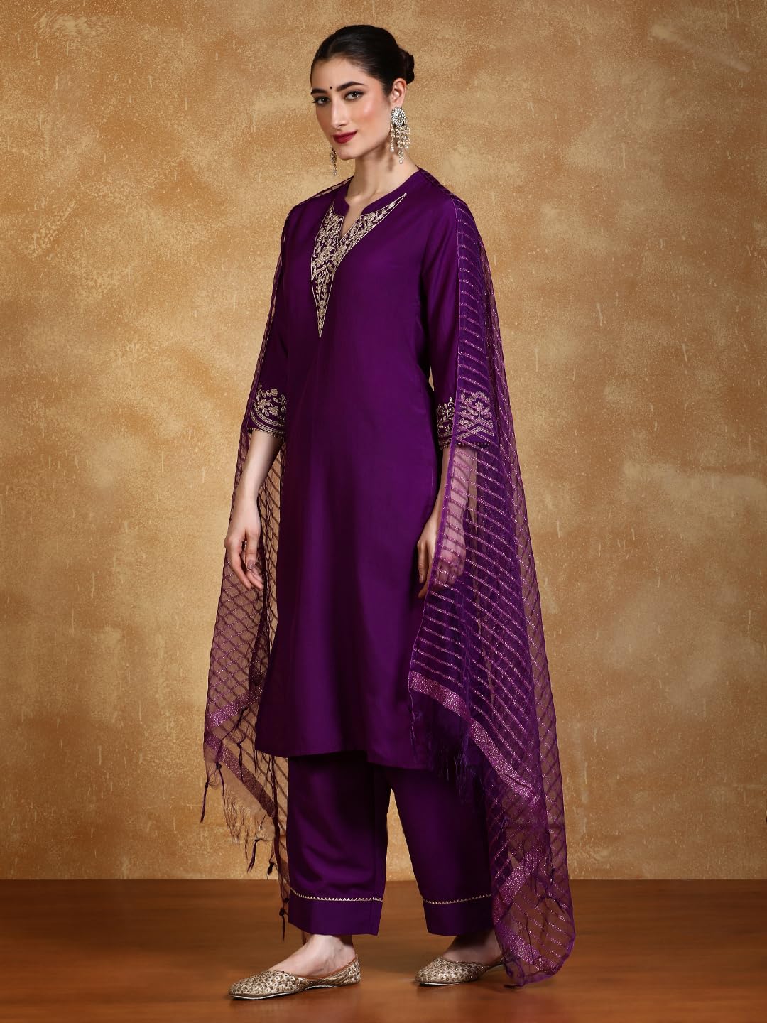 Varanga Zari Embroidered Neck Kurta With Trouser And Dupatta.
