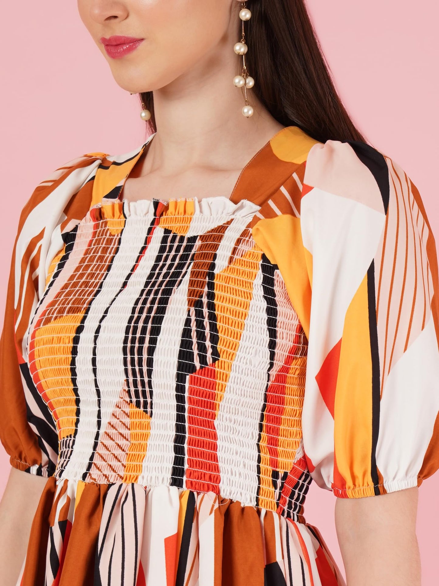 Kzully | Elevated Elegance Redefining Style With The Smocked A-Line Midi Dress